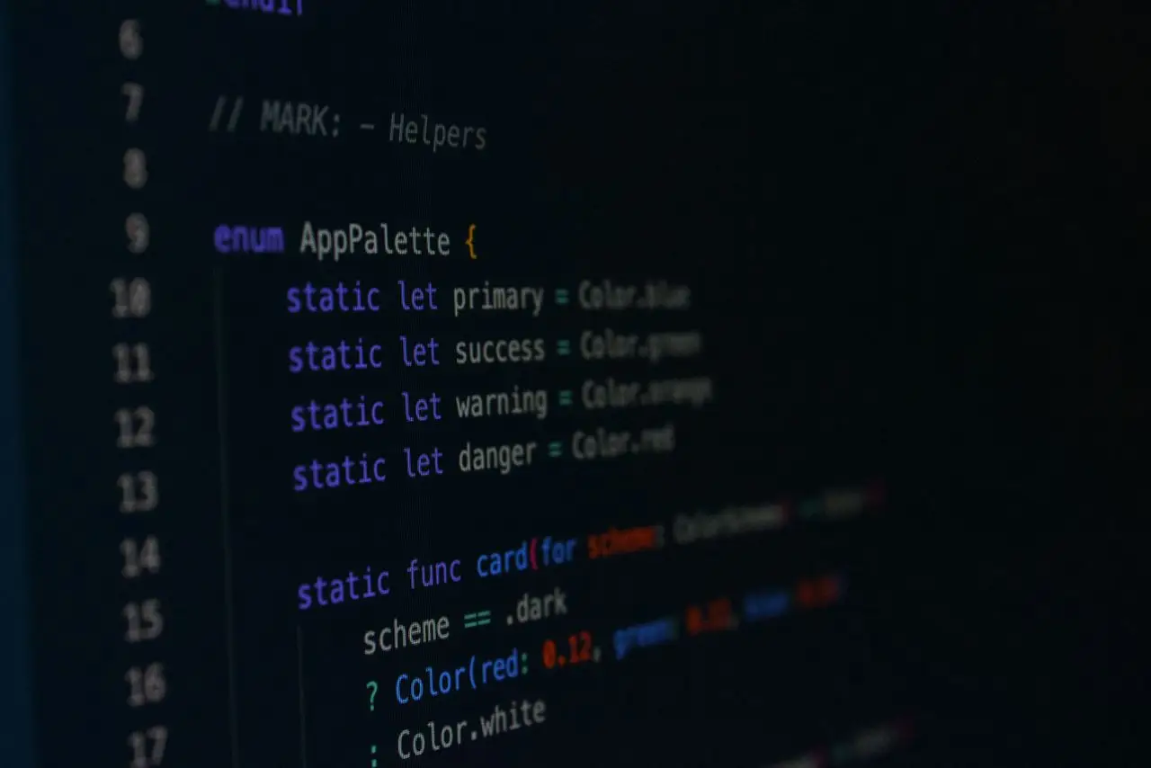 Macro photography of color palette code in a programming environment.